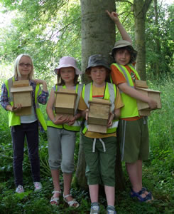 Children with nest boxes