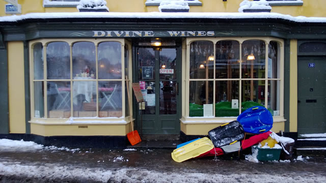 Sledges, and close approximations, parked outside Divine Wines on Wincanton High Street