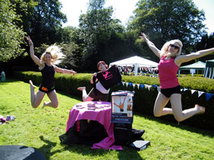 Laughing ladies leaping