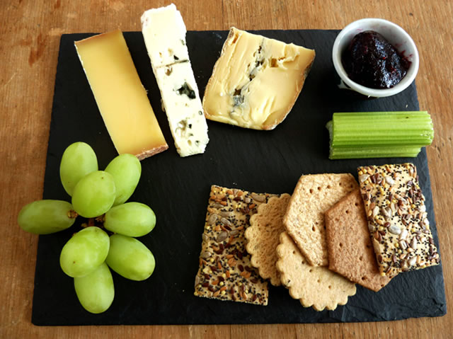 Cheese and grapes on a slate, served at Truffles restaurant, Bruton