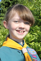 Alice Macey, age 11, invested in the 2nd Templecombe Scout Group