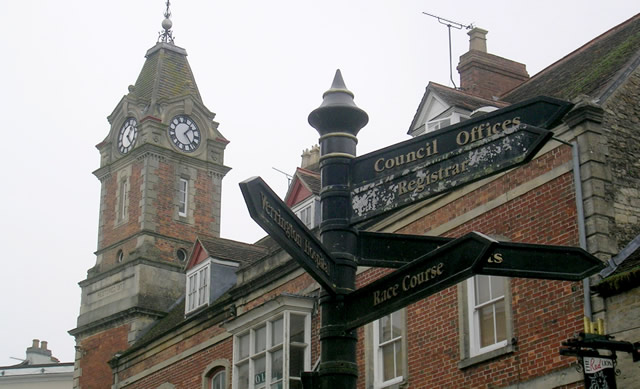 Wincanton Town Hall clock tower and Market Place signpost