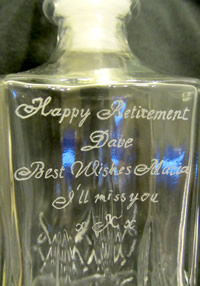 Hand-engraved glass bottle