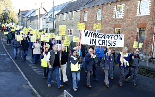 Wincanton in Crisis protest march proceeding down South Street