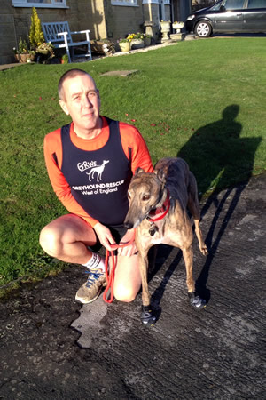 Shaun Andrews with greyhound Benji