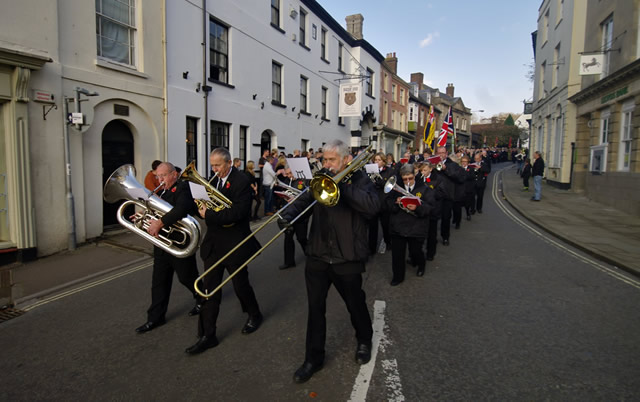 Wincanton Silver Band leading the 2014 Remembrance Day Parade down Wincanton High Street