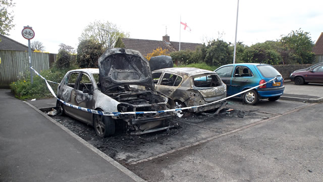 Burnt cars in Wincanton Memorial Hall car park