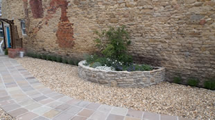 The east wall and raised bed
