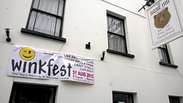 The Winkfest banner hanging outside The Bear Inn, Wincanton