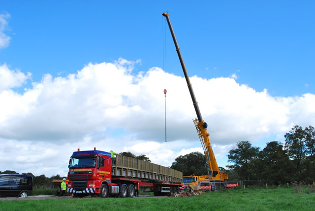 The articulated lorry and crane that will be delivering the new footbridge to Cale Park