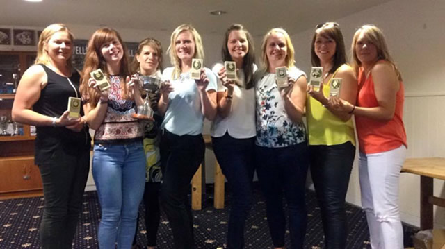 Robins Netball Club with trophies