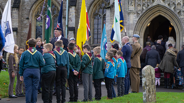Wincnaton's 2019 Remembrance Parade flag bearers at the entrance of the Parish Church of St. Peter & St. Pauls