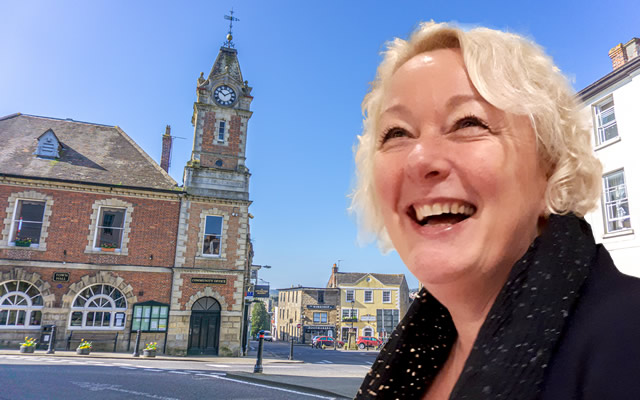 Councillor Sue Shelbourn-Barrow, superimposed in front of Wincanton Town Hall and Market Place