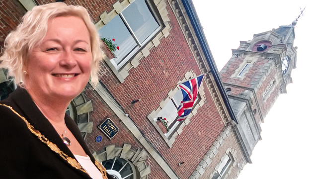 Wincanton's Mayor, Sue Shelbourn-Barrow, in front of the Town Hall and Community Office
