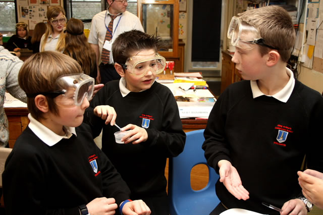 King Arthur's Science students conducting an experiment