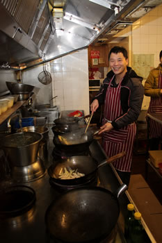 Jin Dong, cooking in his Lotus House kitchen