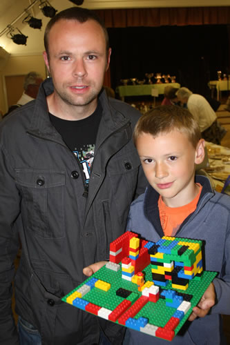Callum Alway with father Peter and his prize-winning "Desert Ruins."