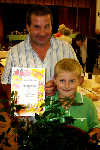 Harry Legg with father Martin and his Prize Winning chilli peppers