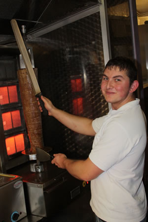 "Jimmy" cutting kebab meat