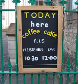 The Listening Ear sign as seen from outside the Baptist Church gate