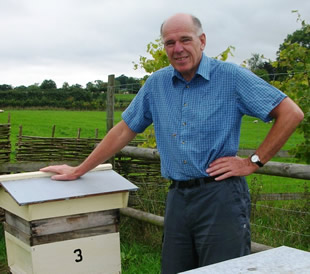 Dr Bob Jones and one of his hives