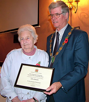 Sylvia Pleasants receiving an award from Mayor Richard D'Arcy