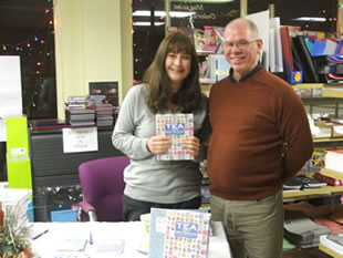 Adrian Ollerton in his book and stationary shop, Papertrees