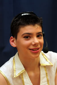 Tom Carroll, playing Joseph, with some kind of Egyptian decorative headset.