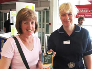 Alison Evans handing out a leaflet