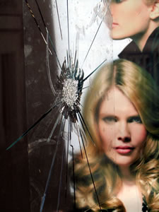 Maxine Davis' smashed window