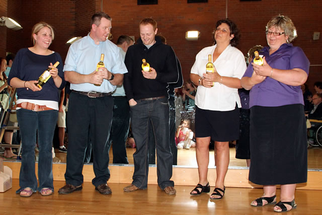 Original staff, still on duty since the Centre opened in 2001, are honoured with bottles of wine