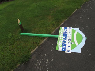 A broken Hambledon "For Sale" sign