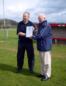 Colin Howell accepting his Groundsman of the Year award.