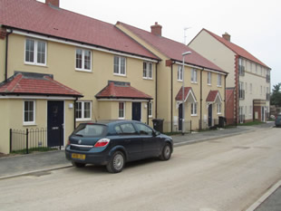 A street, and a reasonably priced car, on the New Barns estate