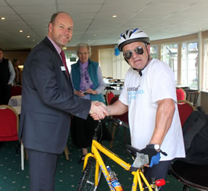 Andy Pollard shaking hands with Steve Ford