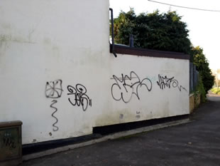 Graffiti on walls in Castle Cary