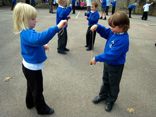 Horsington Primary School chrildren playing conkers