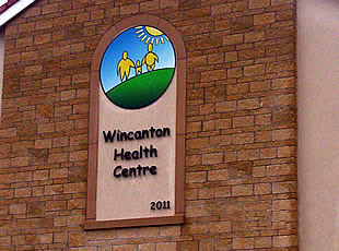 The new logo, stuck to the side of the new Wincanton Health Centre