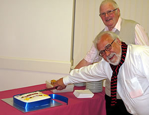 Cutting the 21st anniversary celebration cake