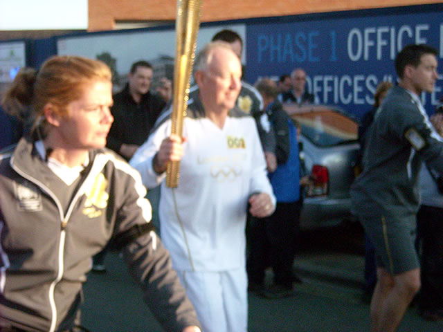 Steve Lafferty running with the Olympic Torch