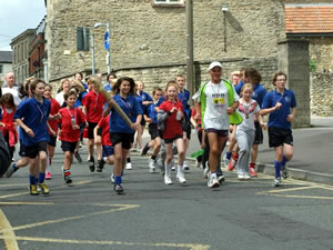 Students running with the torch
