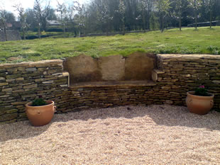 A seat within a dry stone wall