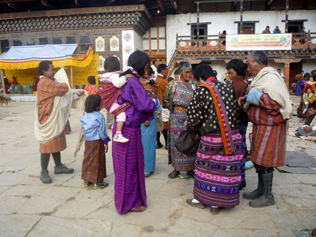 A Bhutan family at a festival