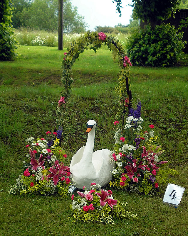A floral decoration involving a swan