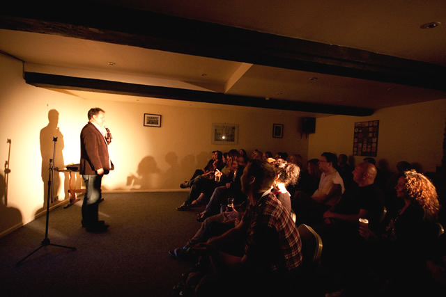 Matthew Baylis, compering at The Barrel of Laughs comedy club at The Nog