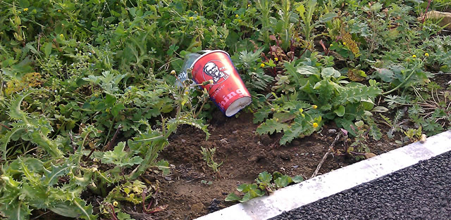 Various drinks cups thrown from a footpath