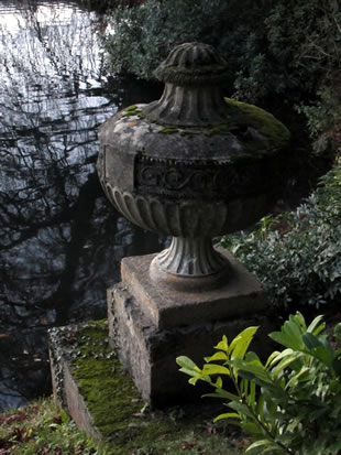 Stone urn by the lake at Stourhead