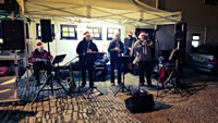 A band playing behind the Dolphin