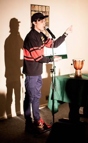 Comedian performing at the Barrel of Laughs Comedy Club at the Nog Inn