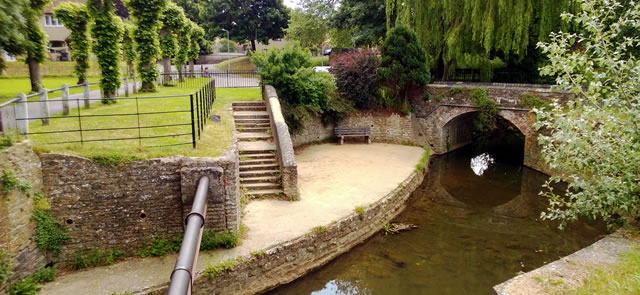 Entrance Garden area, including the river platform under the bridge